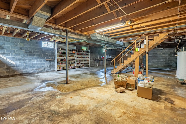 basement featuring gas water heater