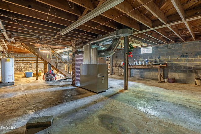 basement featuring electric water heater