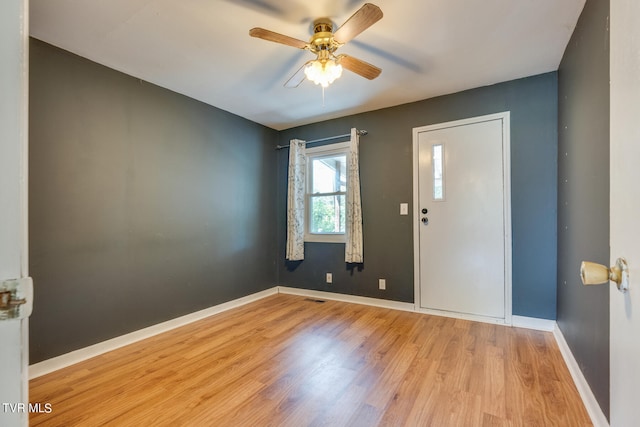 interior space featuring ceiling fan and light hardwood / wood-style flooring