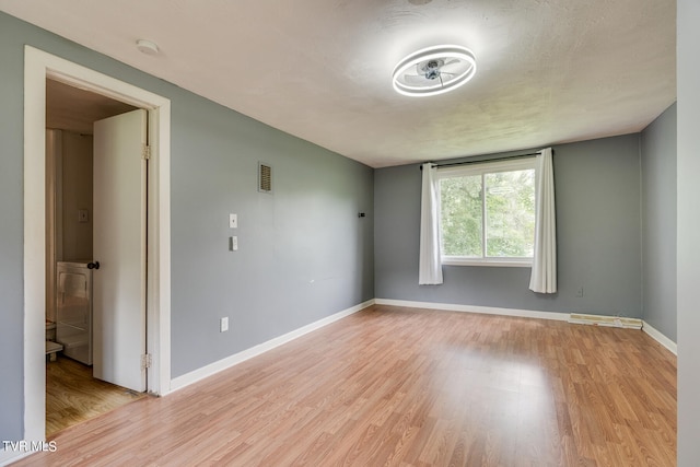 empty room featuring light hardwood / wood-style flooring