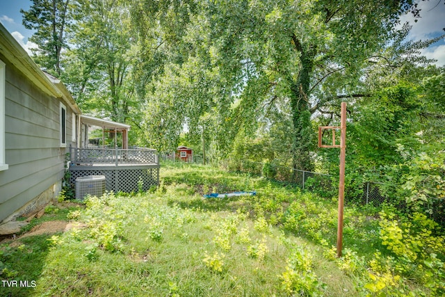 view of yard with central air condition unit