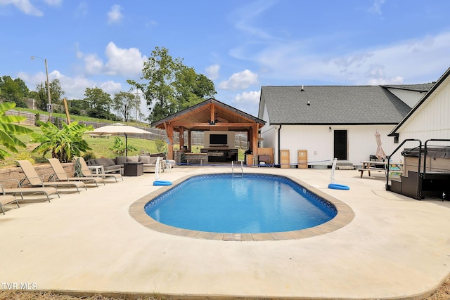 pool featuring fence, an outdoor hangout area, a patio, and a gazebo