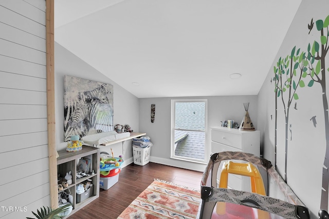 interior space with dark wood-style flooring and baseboards