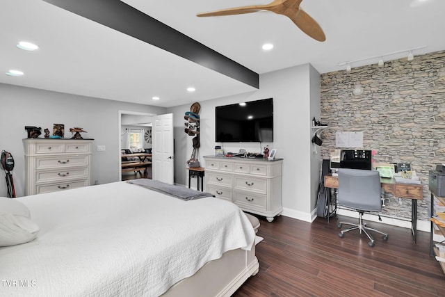 bedroom with rail lighting, baseboards, dark wood-style flooring, and recessed lighting