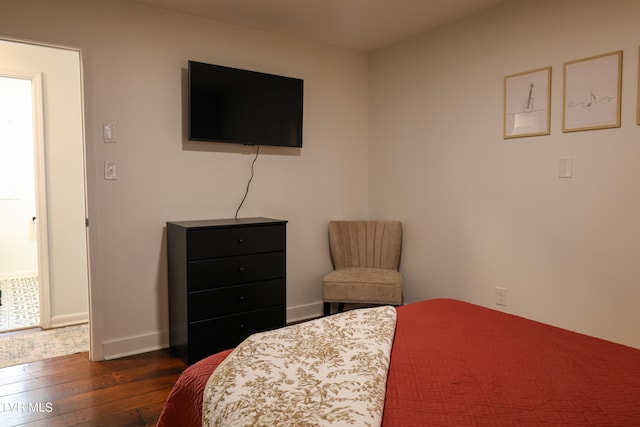 bedroom featuring wood-type flooring