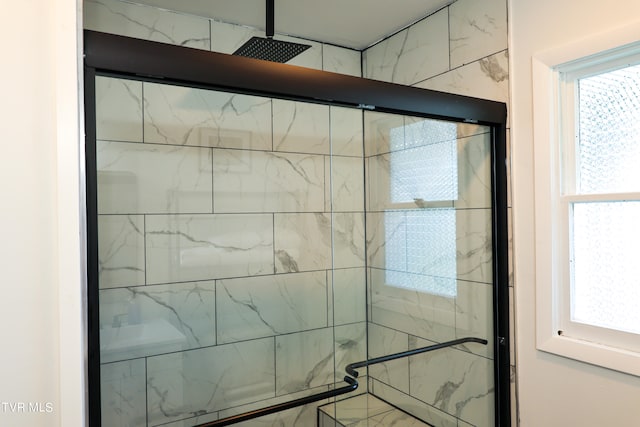 bathroom featuring a wealth of natural light