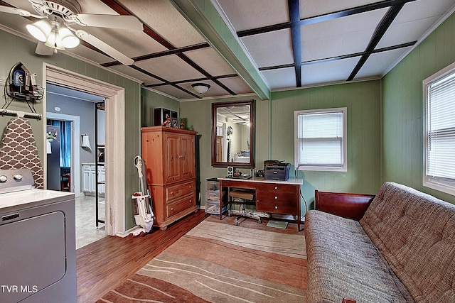 home office featuring washer / clothes dryer, wood-type flooring, and ceiling fan