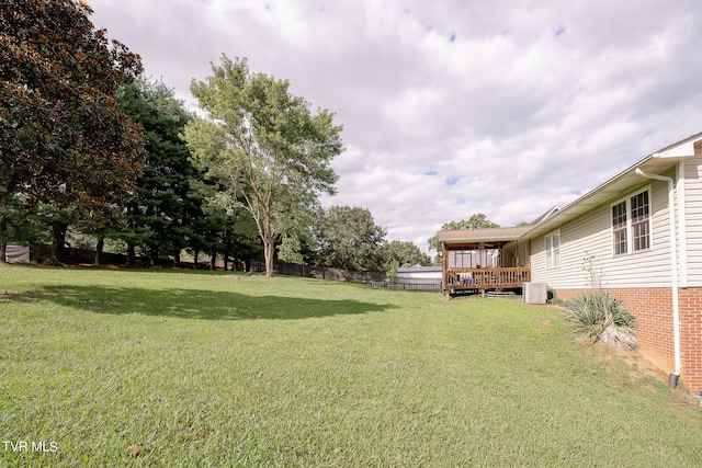 view of yard featuring a deck