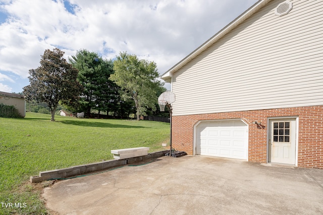 garage with a yard