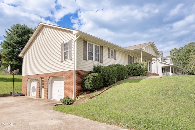 view of property exterior with a yard and a garage