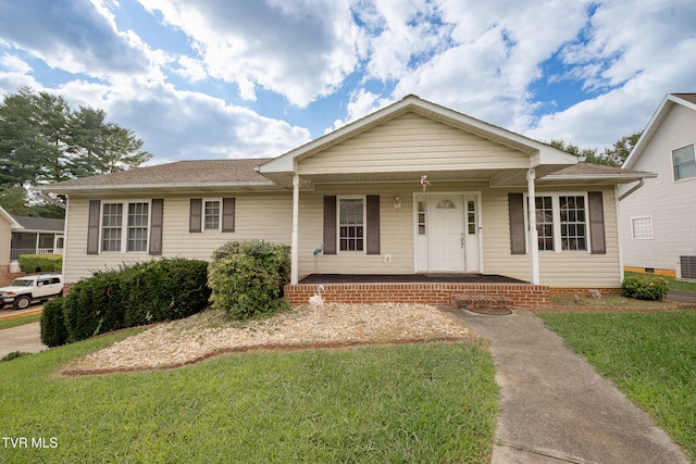 view of front of home featuring a porch and a front lawn