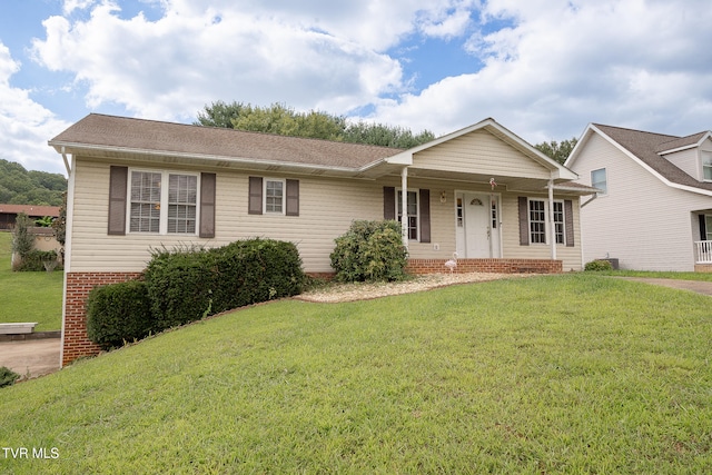 ranch-style house with a front lawn