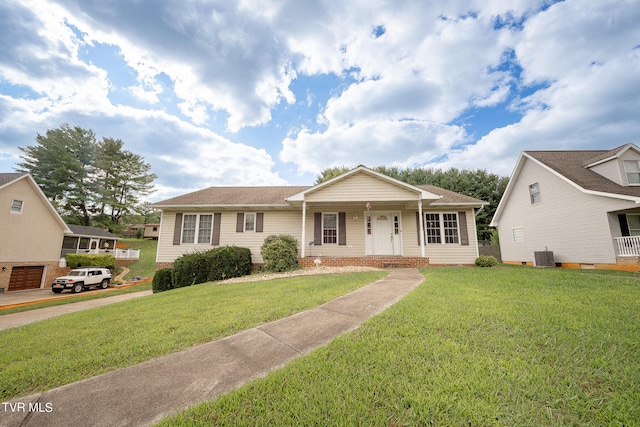 view of front of home featuring a garage and a front yard