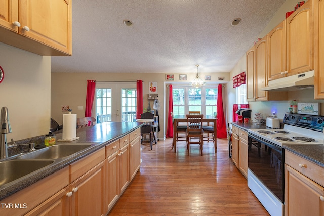 kitchen with light hardwood / wood-style floors, french doors, sink, electric stove, and a textured ceiling