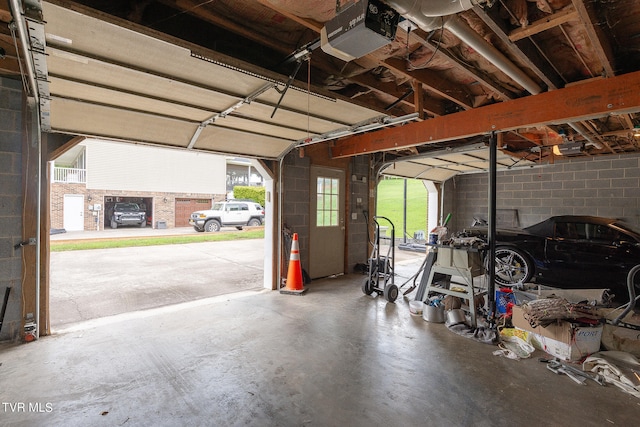 garage featuring a garage door opener