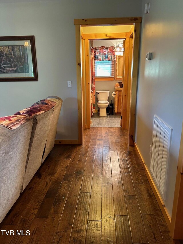 corridor featuring hardwood / wood-style flooring