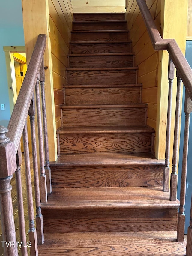 stairs with wooden walls