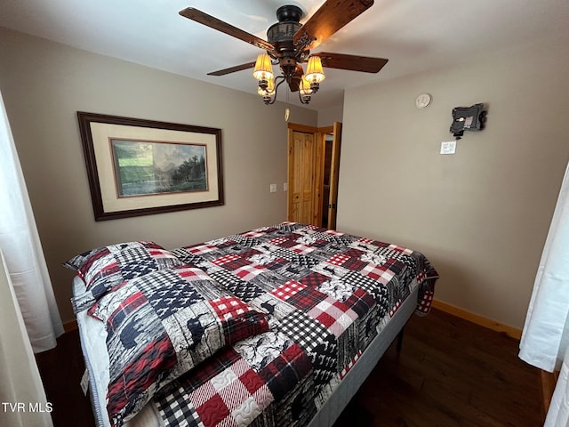 bedroom featuring ceiling fan and wood-type flooring