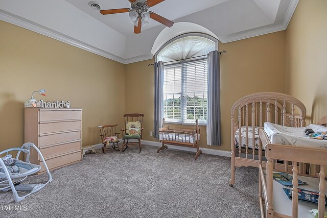 bedroom with ornamental molding and carpet flooring