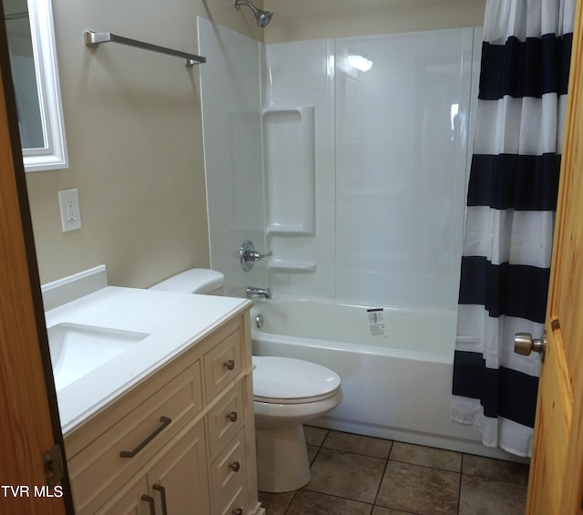 full bathroom with vanity, toilet, shower / tub combo, and tile patterned floors