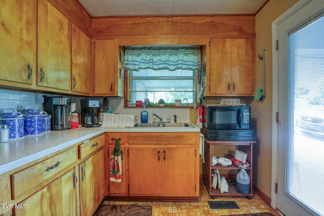 kitchen with sink and backsplash