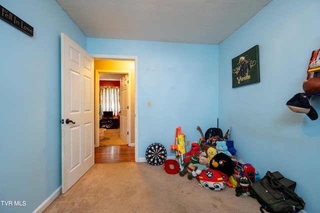 game room with carpet flooring