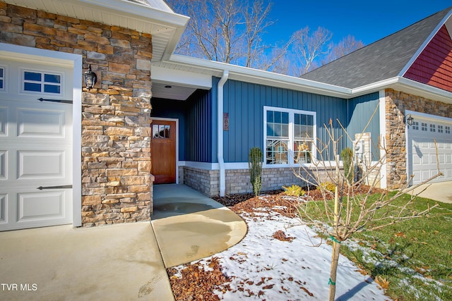 entrance to property featuring a garage