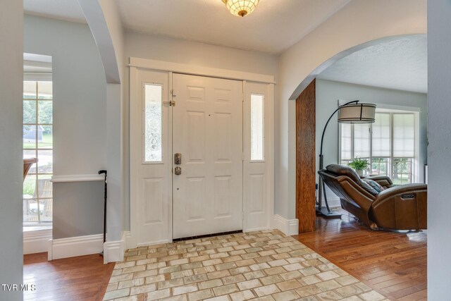 entryway with light hardwood / wood-style floors