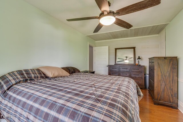 bedroom featuring ceiling fan and hardwood / wood-style flooring