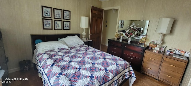 bedroom featuring wood finished floors