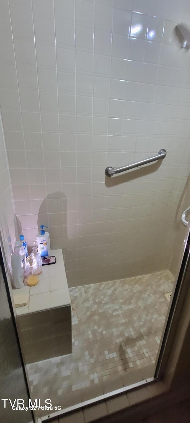 bathroom featuring a stall shower