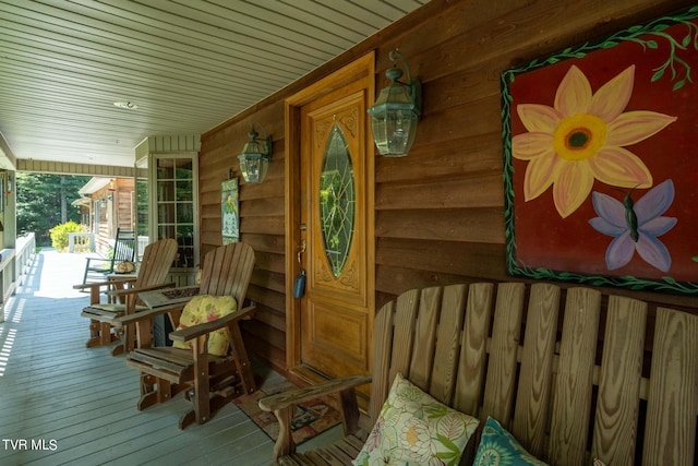 wooden terrace with covered porch