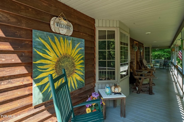 wooden terrace with covered porch