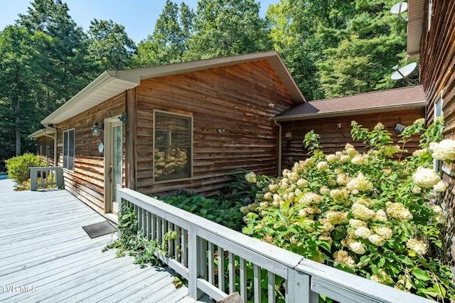 view of home's exterior with a deck