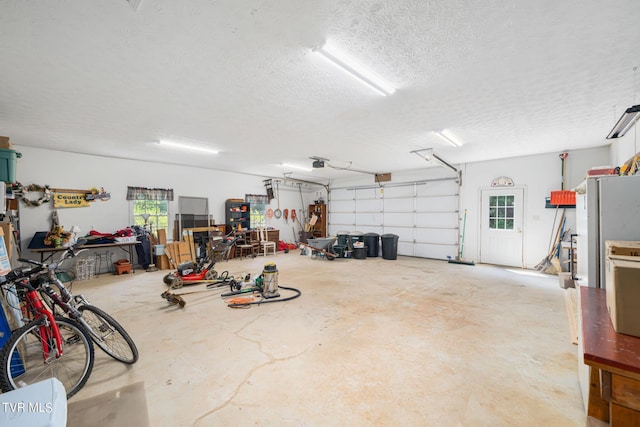 garage with freestanding refrigerator