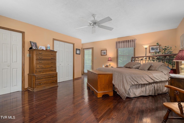 bedroom with ceiling fan, a textured ceiling, and wood finished floors