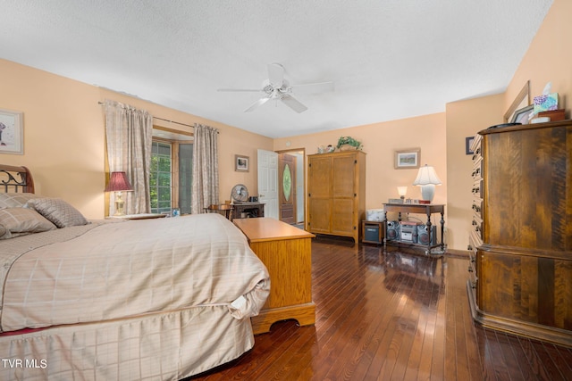 bedroom with a ceiling fan and hardwood / wood-style floors