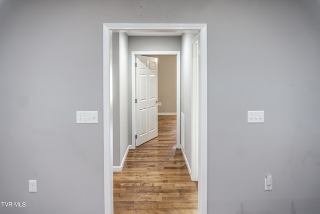 hall featuring hardwood / wood-style flooring