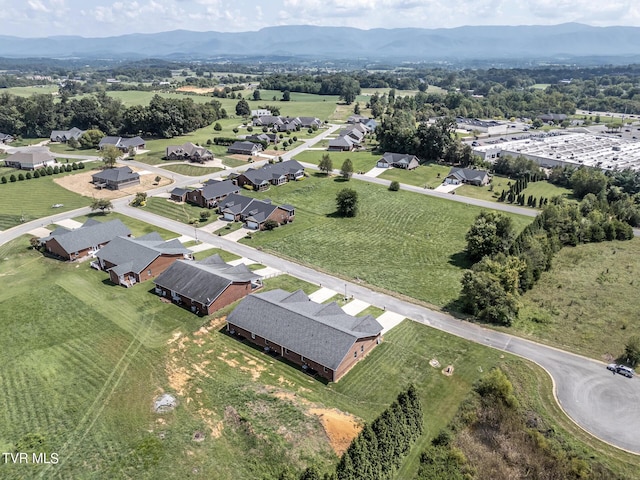 bird's eye view featuring a residential view and a mountain view