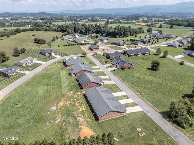 bird's eye view featuring a mountain view and a residential view