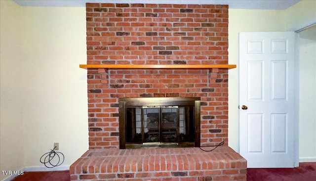 details with a brick fireplace