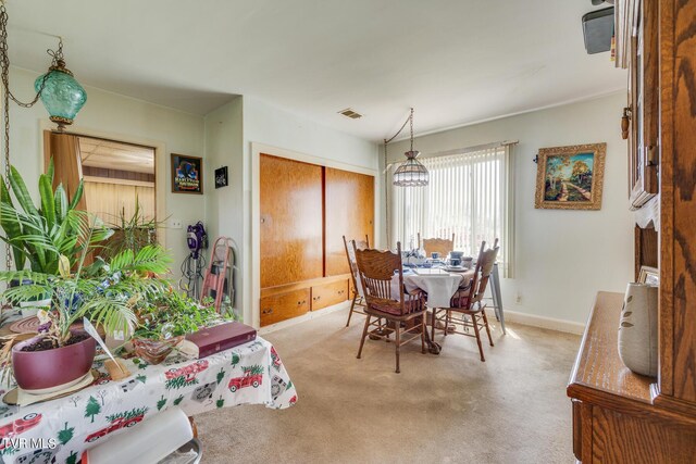 view of carpeted dining room