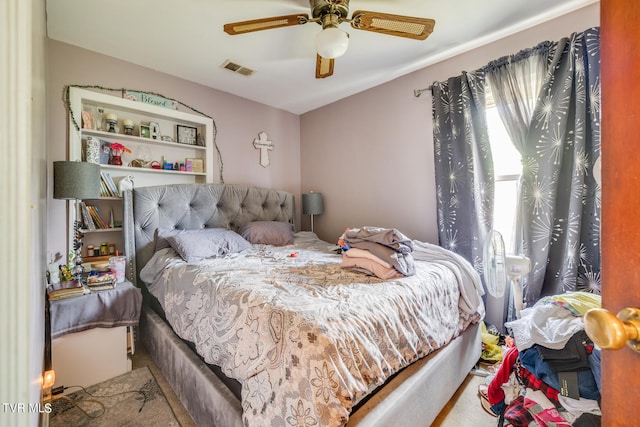 bedroom featuring ceiling fan and carpet flooring