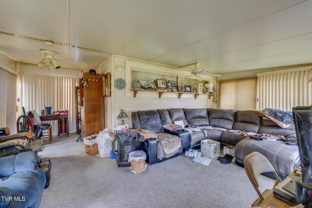 living room featuring ceiling fan and carpet flooring