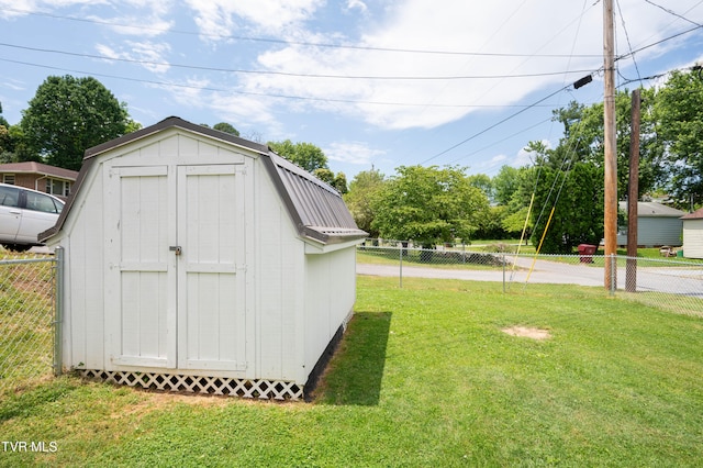 view of outdoor structure with a yard