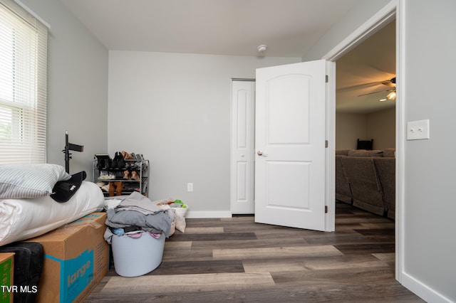 bedroom featuring dark wood-type flooring