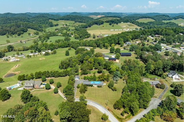 birds eye view of property featuring a rural view