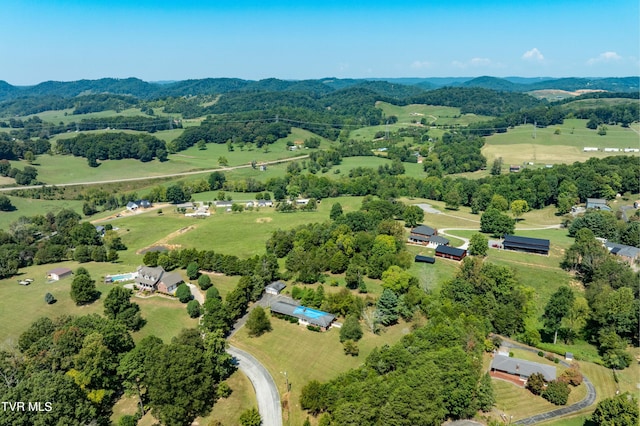 aerial view with a mountain view and a rural view