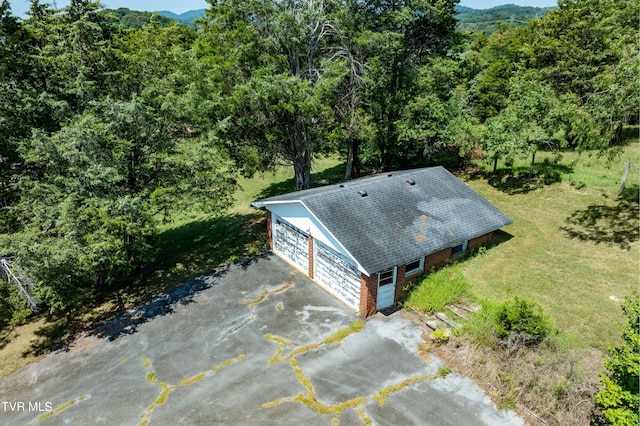 bird's eye view featuring a view of trees