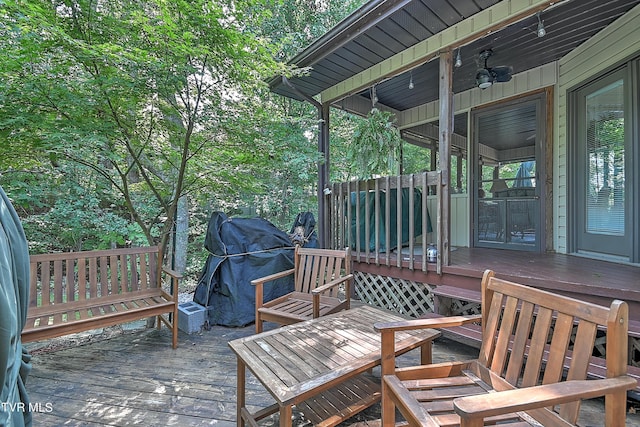 wooden deck featuring grilling area